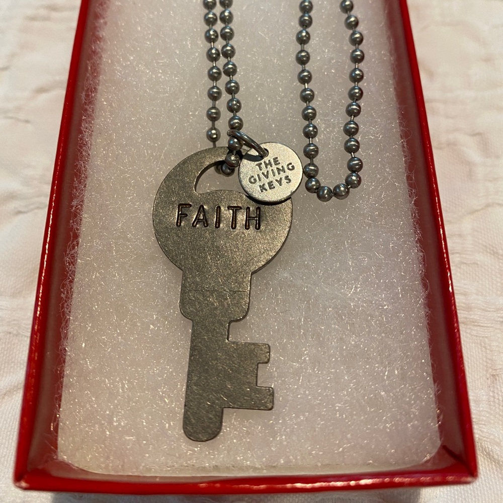 The Giving Keys Necklace! This one has the word “Faith” on it and it is silver!